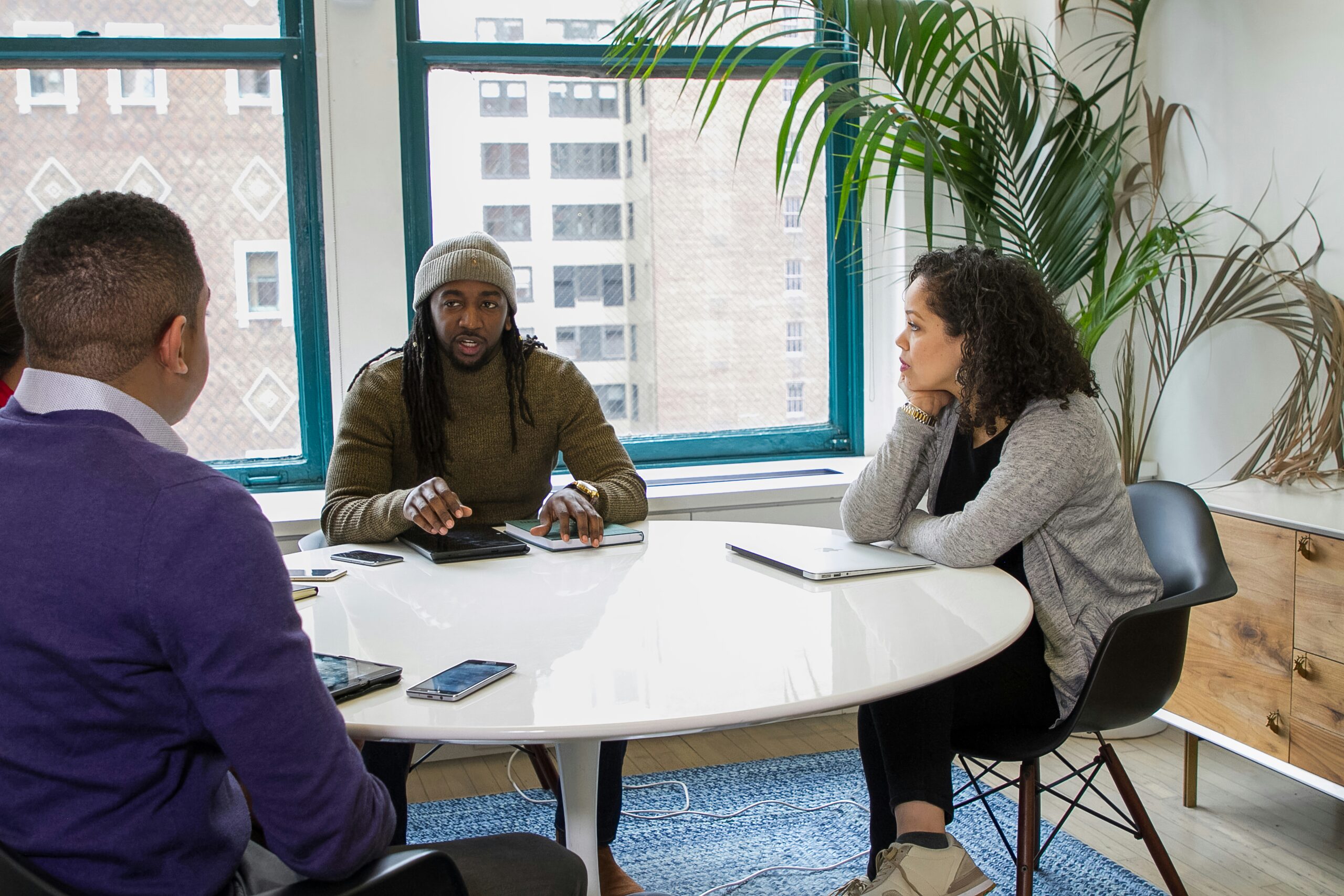People sitting around a table in an office